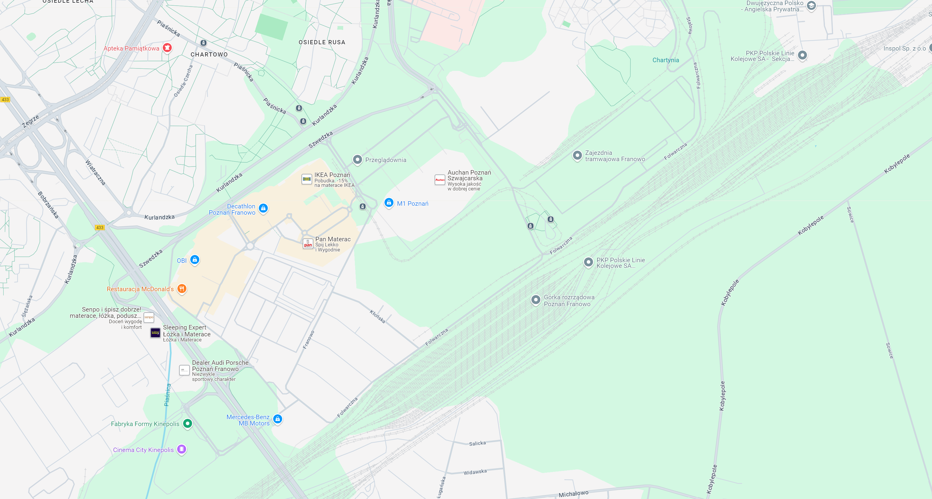 Mapka przedstawiająca okolice Poznania, w tym drogi, punkty handlowe takie jak Auchan i IKEA oraz miejsca użyteczności publicznej. Obszar ten może być interesujący dla producentów myjni bezdotykowych z uwagi na rozwijającą się infrastrukturę.